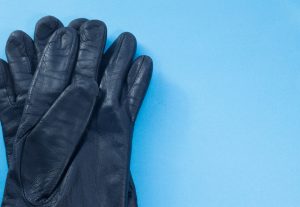 Two black leather gloves